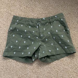 army green shorts with cacti